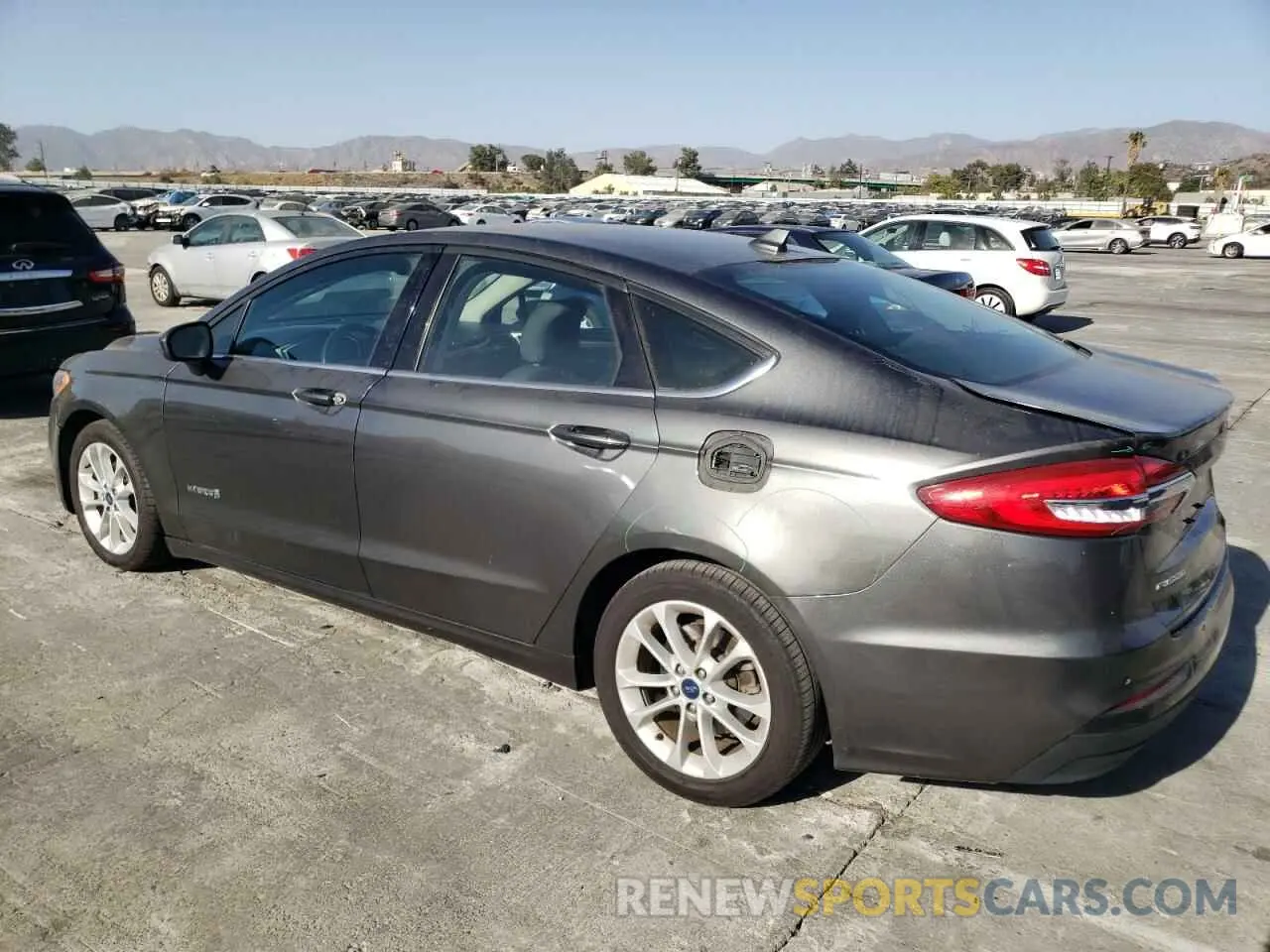 2 fotografías del automóvil dañado 3FA6P0LU4KR143708 FORD FUSION 2019