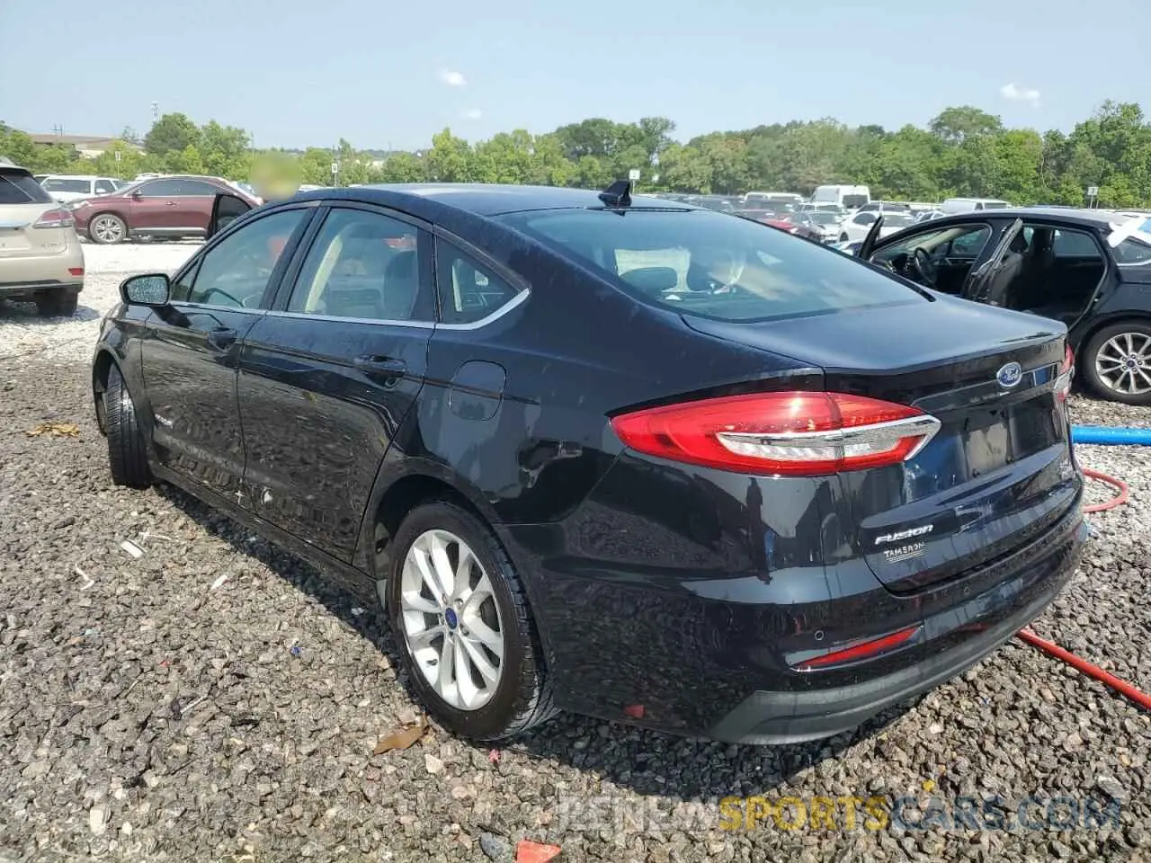 2 fotografías del automóvil dañado 3FA6P0LU9KR117248 FORD FUSION 2019