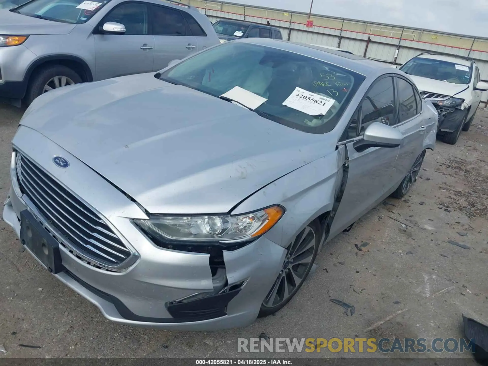 2 fotografías del automóvil dañado 3FA6P0T97KR269301 FORD FUSION 2019