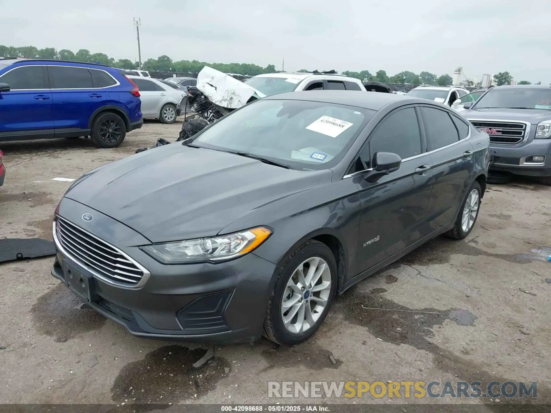 2 fotografías del automóvil dañado 3FA6P0LU3KR210122 FORD FUSION HYBRID 2019