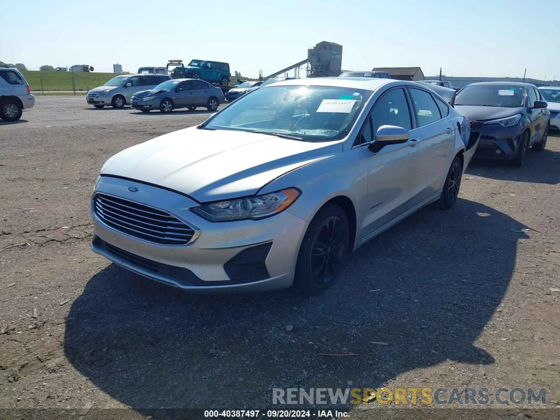 2 fotografías del automóvil dañado 3FA6P0LU6KR110208 FORD FUSION HYBRID 2019