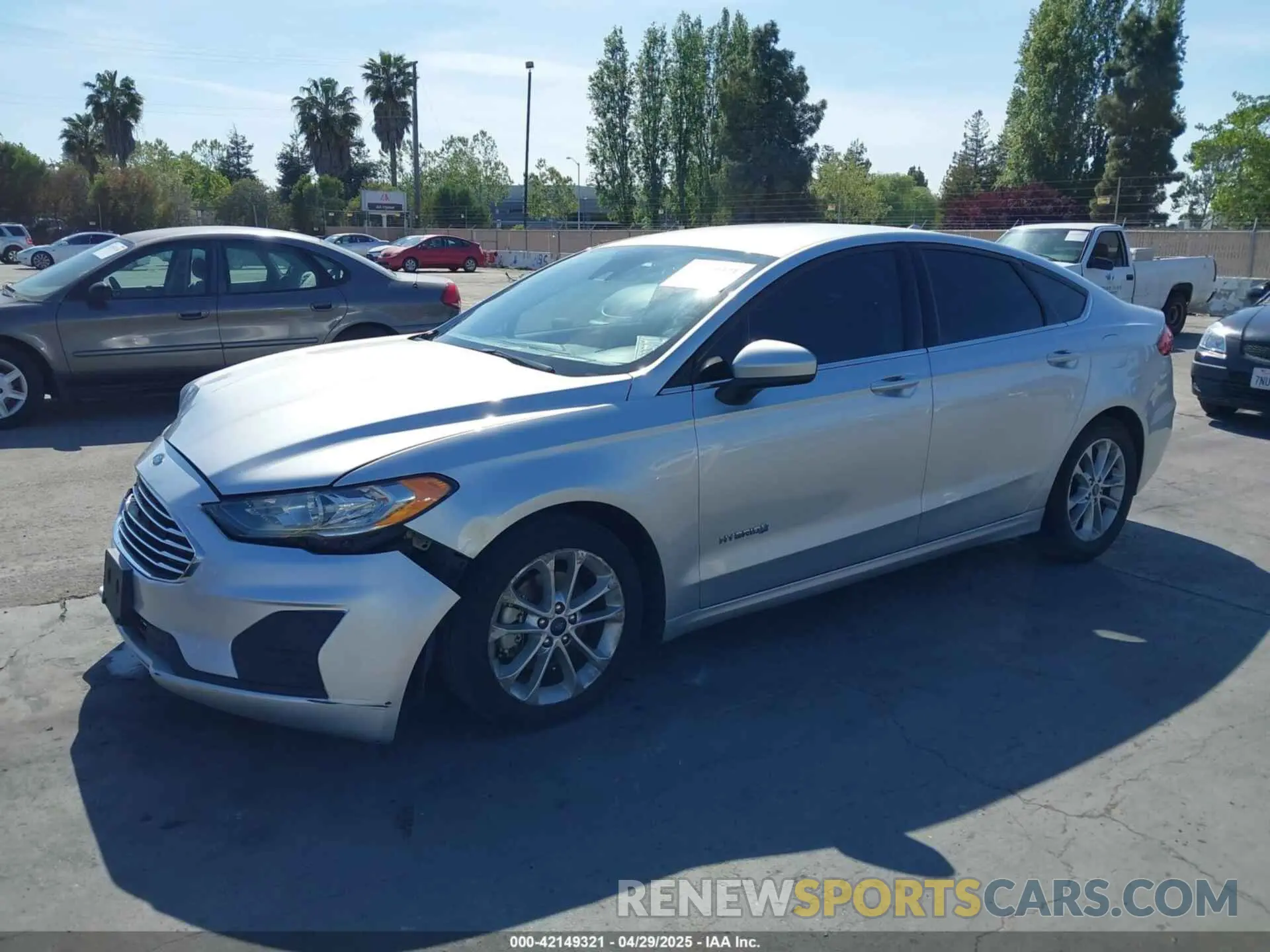 2 fotografías del automóvil dañado 3FA6P0LU7KR137840 FORD FUSION HYBRID 2019