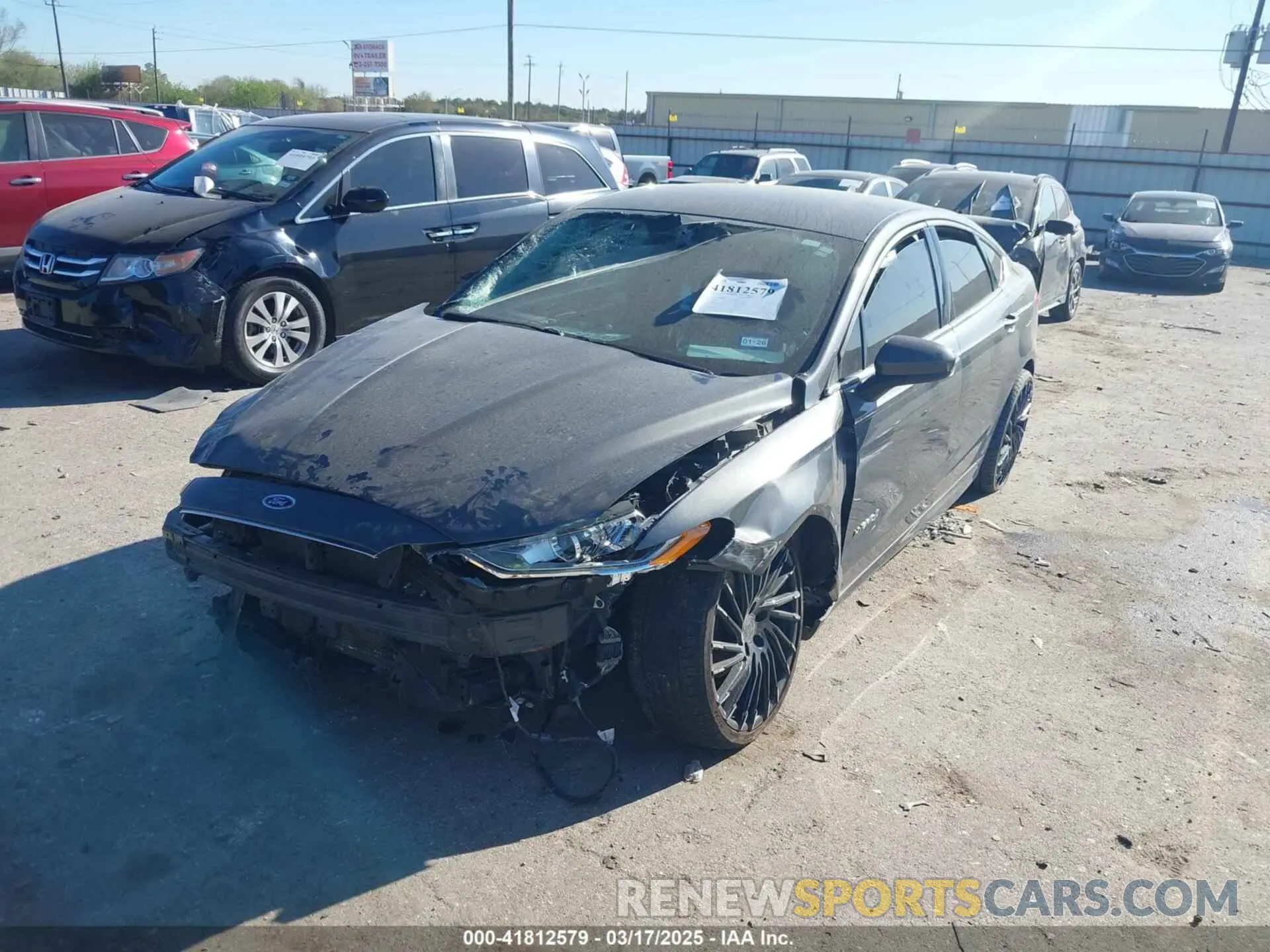 2 fotografías del automóvil dañado 3FA6P0LU9KR189728 FORD FUSION HYBRID 2019