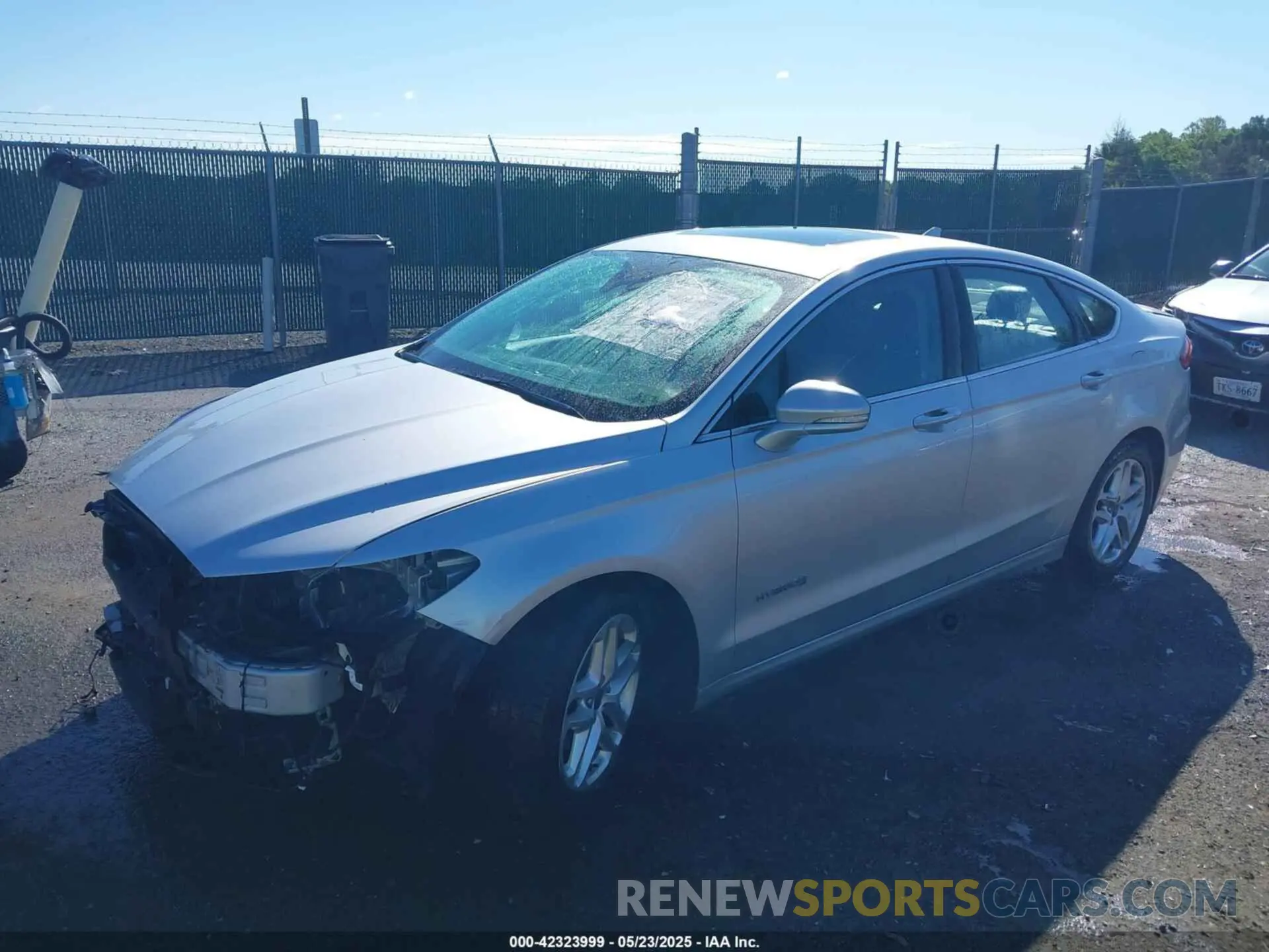 2 fotografías del automóvil dañado 3FA6P0RUXKR141565 FORD FUSION HYBRID 2019