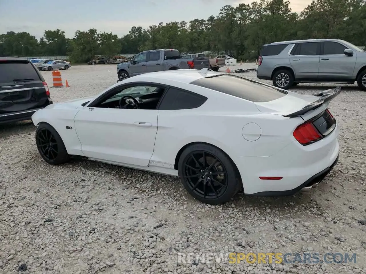 2 fotografías del automóvil dañado 1FA6P8CF1P5301657 FORD MUSTANG 2023