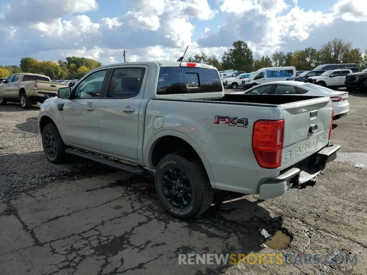 2 fotografías del automóvil dañado 1FTER4FH4PLE29473 FORD RANGER 2023