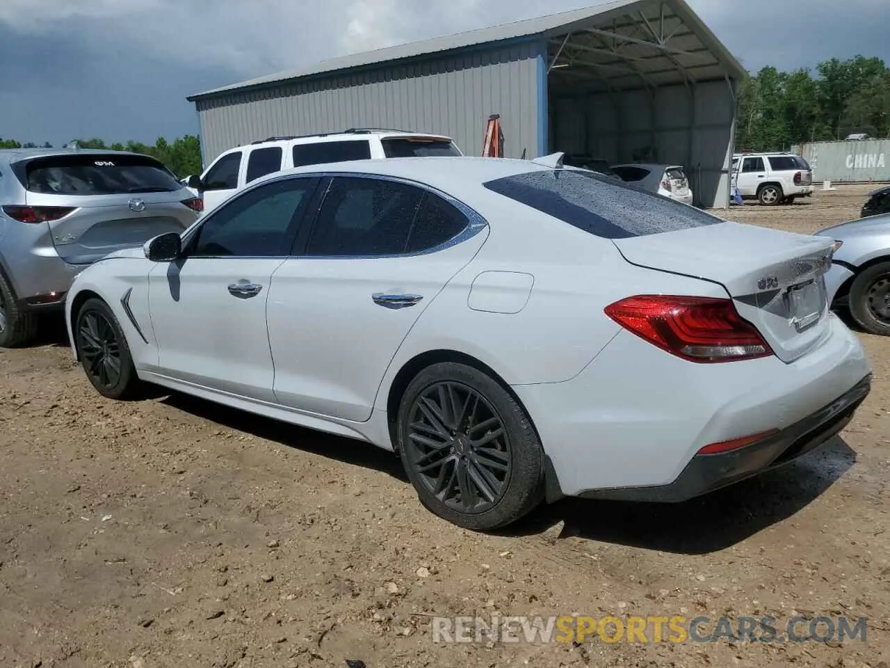 2 fotografías del automóvil dañado KMTG64LA6MU073480 GENESIS G70 2021