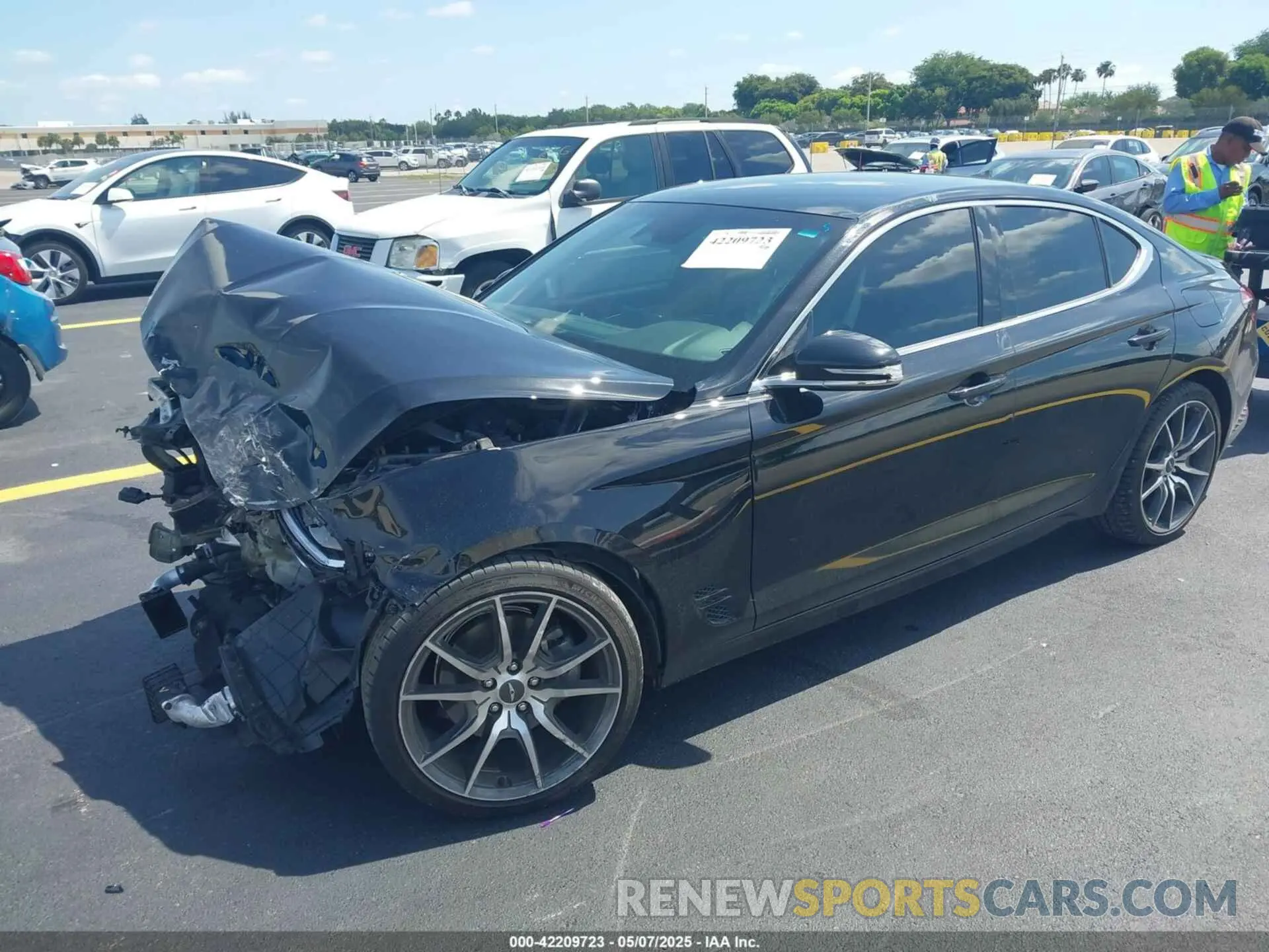 2 fotografías del automóvil dañado KMTG34TA4PU135164 GENESIS G70 2023