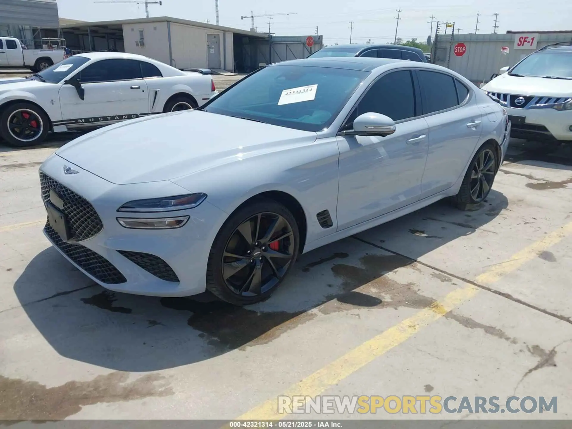 2 fotografías del automóvil dañado KMTG54TEXPU107592 GENESIS G70 2023