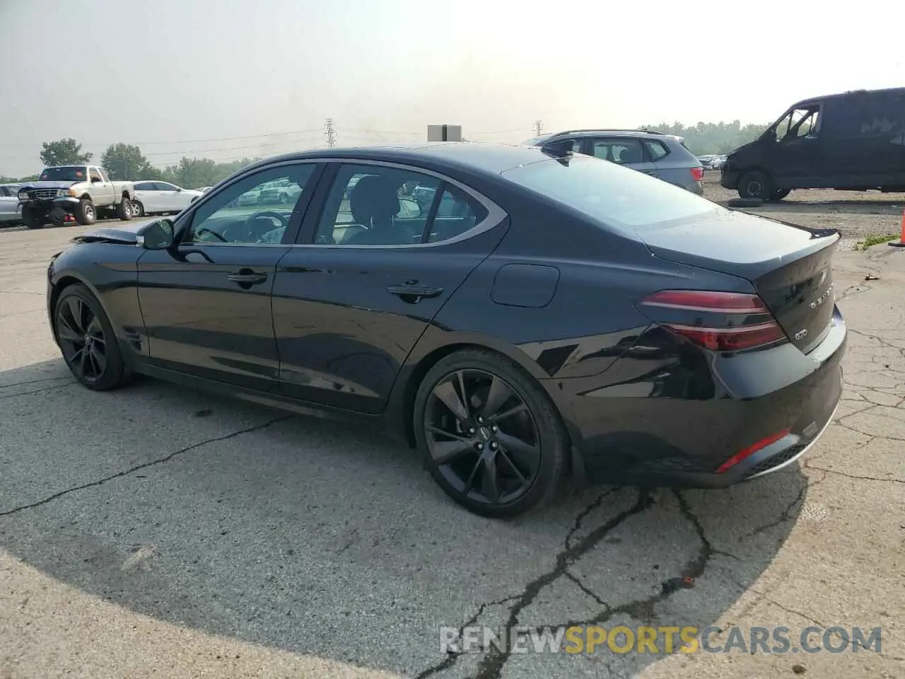 2 fotografías del automóvil dañado KMTG34TA7PU116043 GENESIS G70 BASE 2023