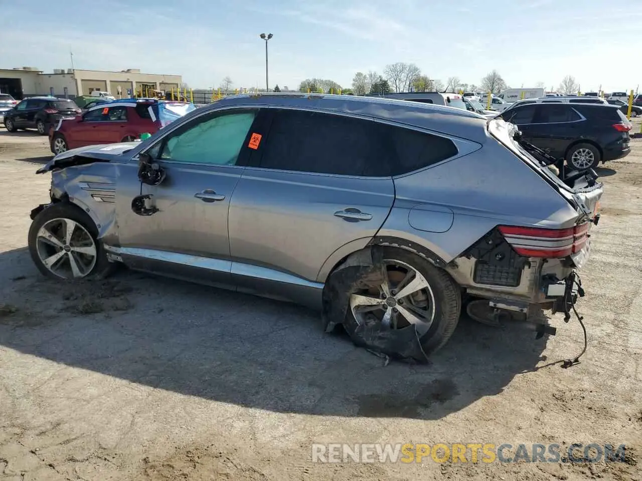 2 fotografías del automóvil dañado KMUHBDSB0MU034504 GENESIS GV80 2021