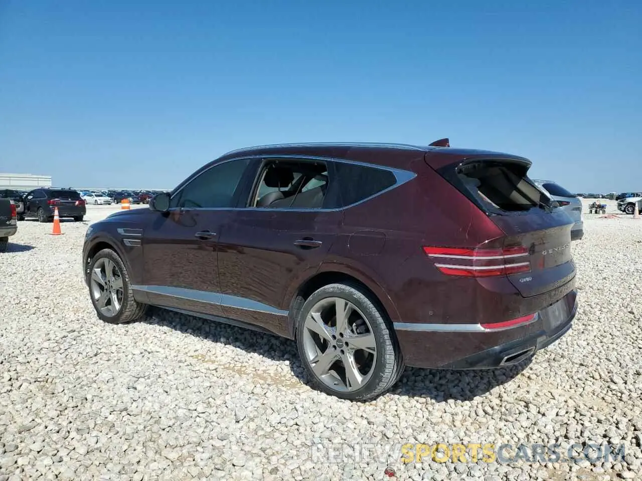 2 fotografías del automóvil dañado KMUHCESC7MU044023 GENESIS GV80 2021