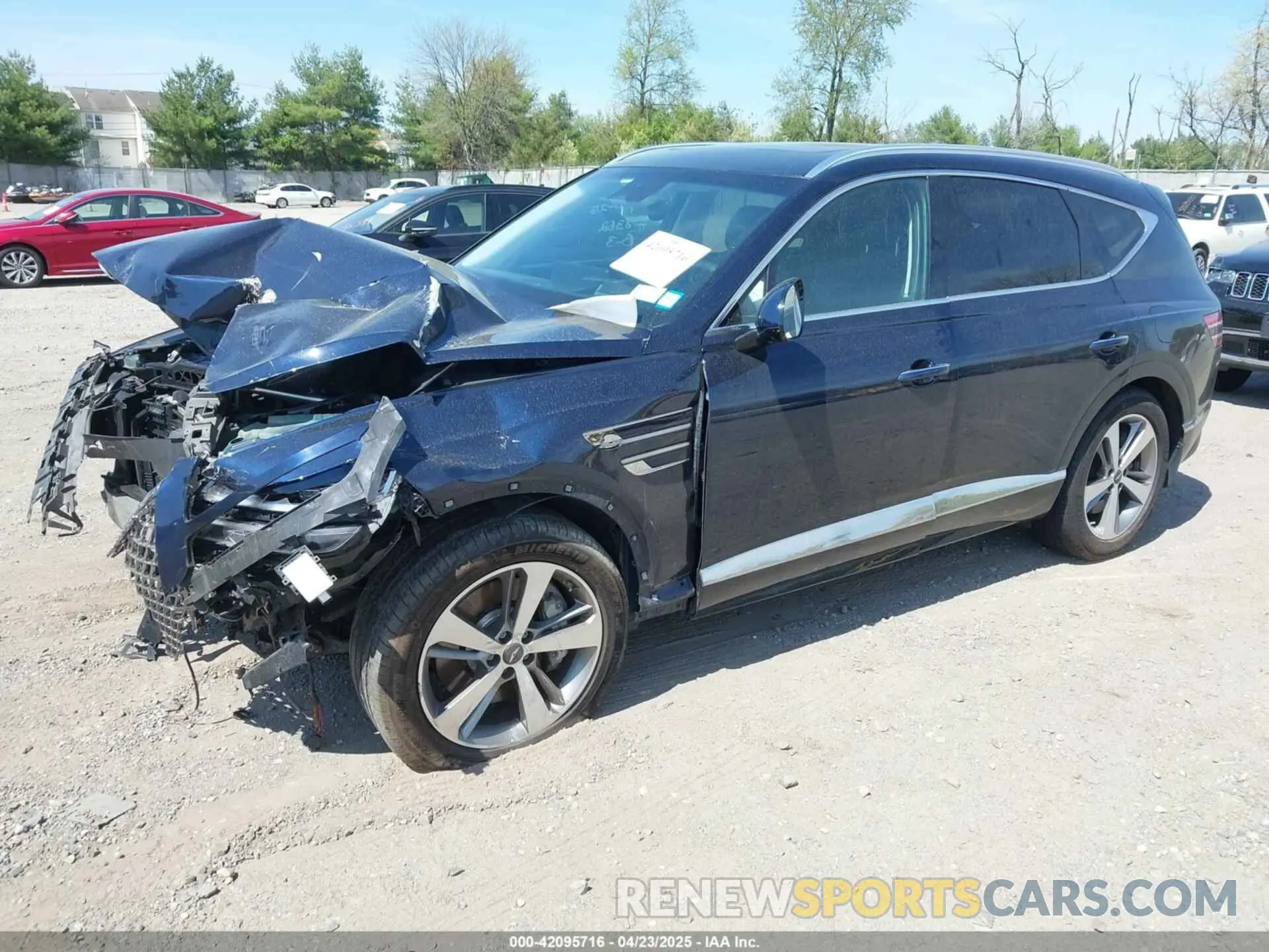 2 fotografías del automóvil dañado KMUHCESC7MU066507 GENESIS GV80 2021