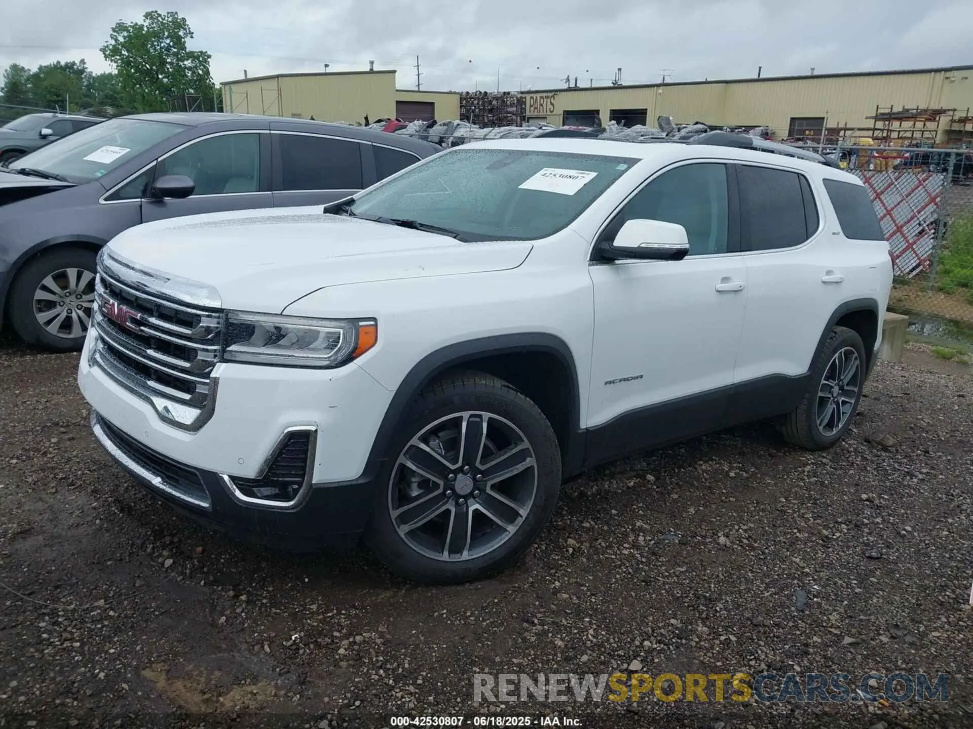 2 fotografías del automóvil dañado 1GKKNML42PZ138438 GMC ACADIA 2023