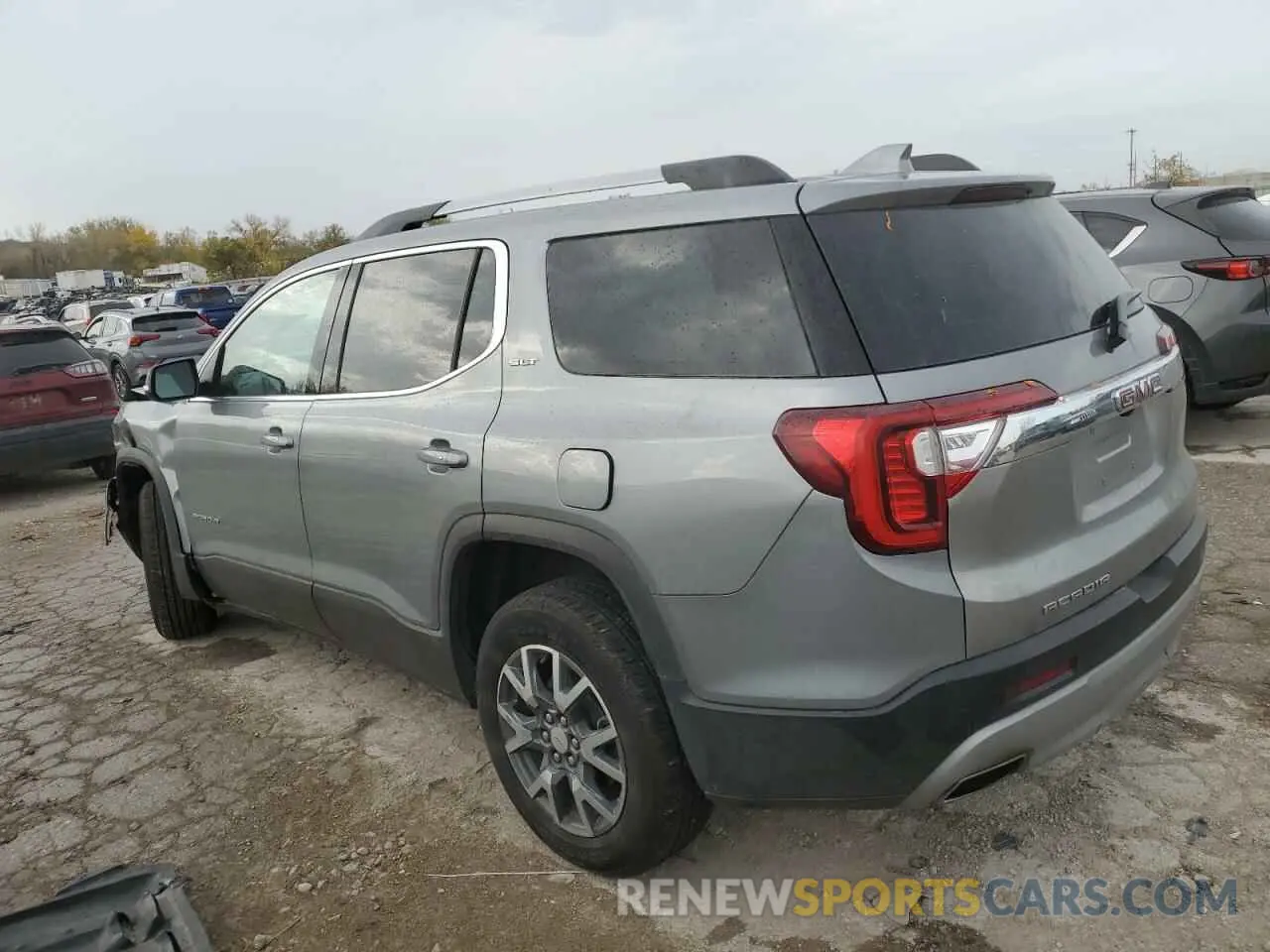 2 fotografías del automóvil dañado 1GKKNML46PZ227946 GMC ACADIA 2023