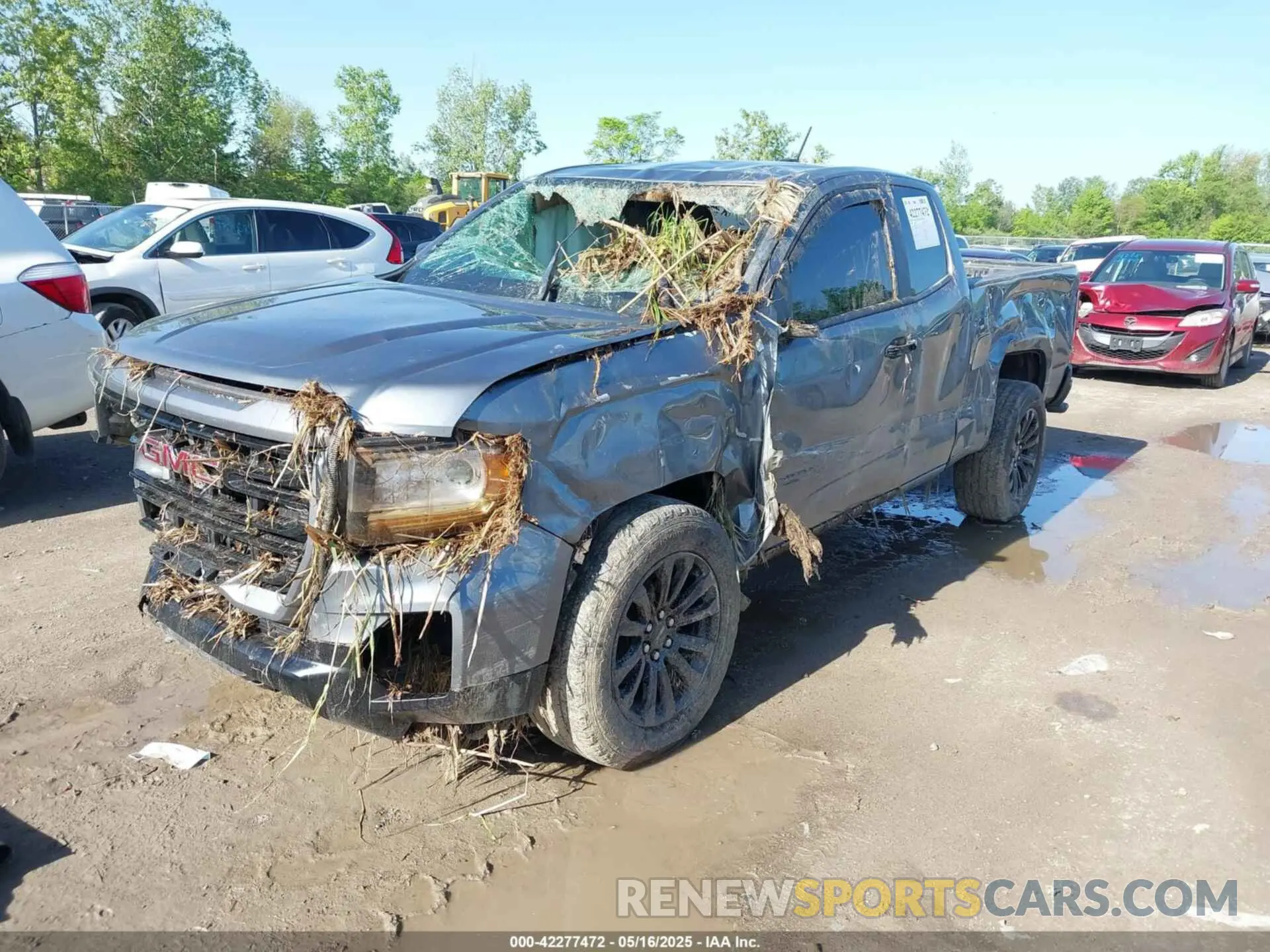 2 fotografías del automóvil dañado 1GTH6BEN2M1216465 GMC CANYON 2021