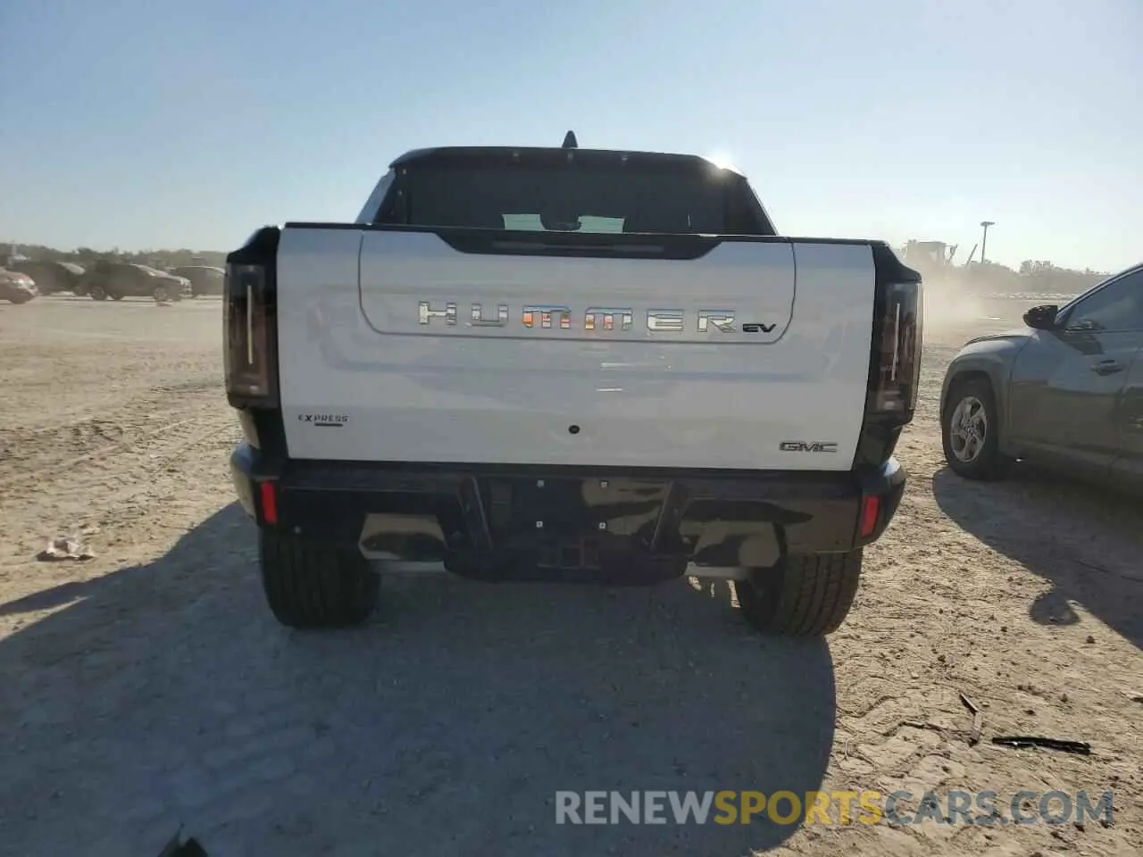 6 fotografías del automóvil dañado 1GT10DDB1SU103382 GMC HUMMER PIC 2025