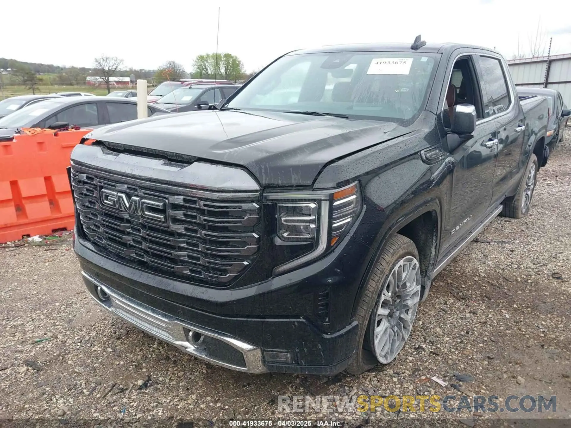 2 fotografías del automóvil dañado 1GTUUHEL3PZ268036 GMC SIERRA 1500 2023