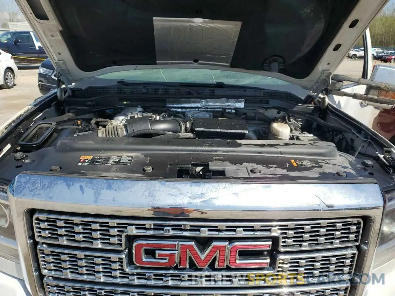 11 fotografías del automóvil dañado 1GT12SEY2KF106040 GMC SIERRA 2019