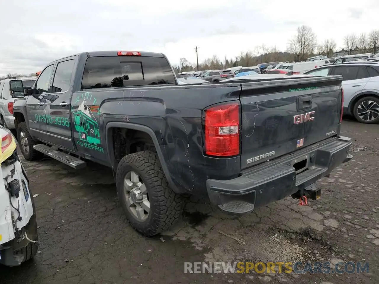 2 fotografías del automóvil dañado 1GT42WEY2KF249008 GMC SIERRA 2019