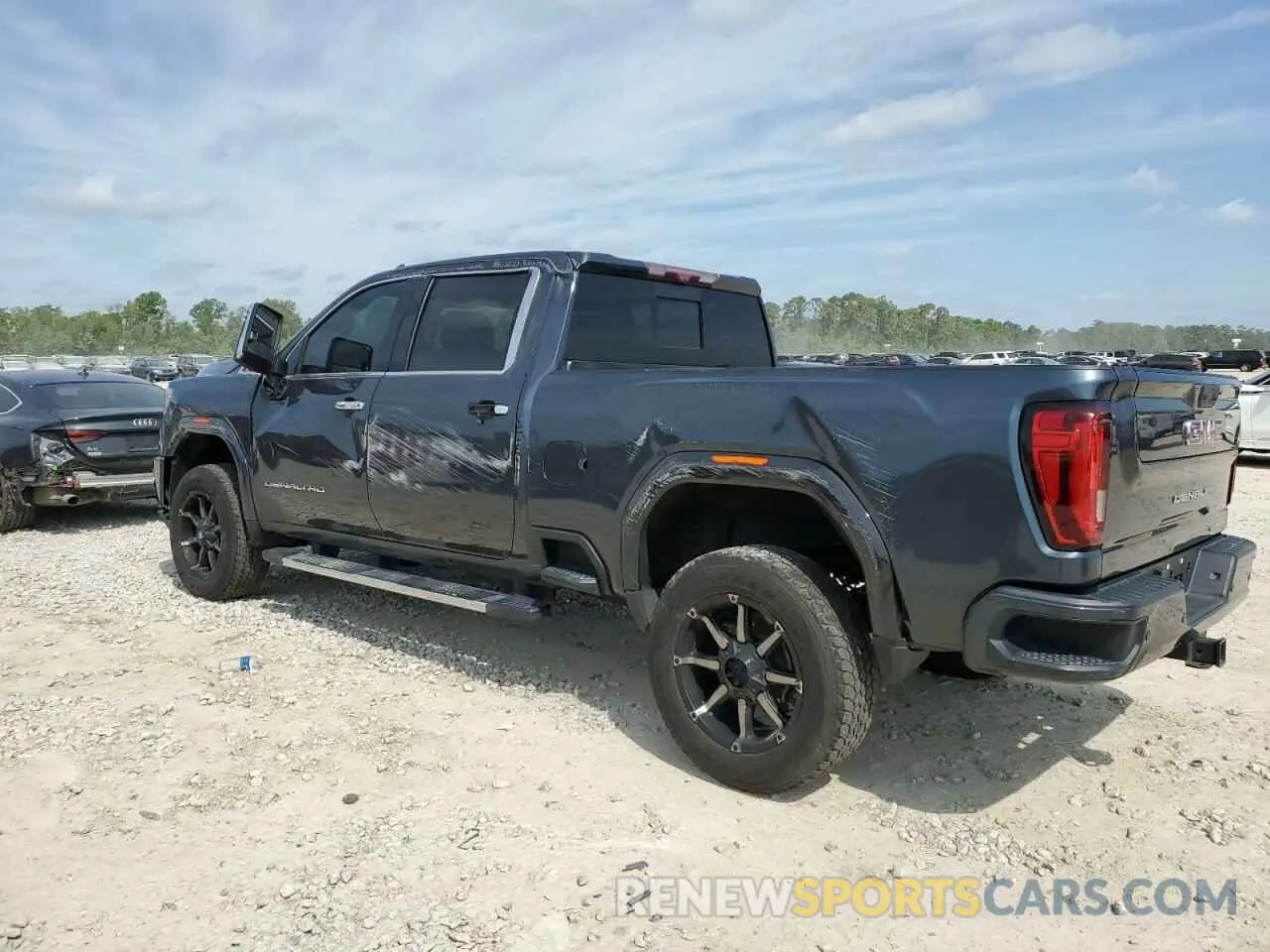 2 fotografías del automóvil dañado 1GT49REY0LF221044 GMC SIERRA 2020
