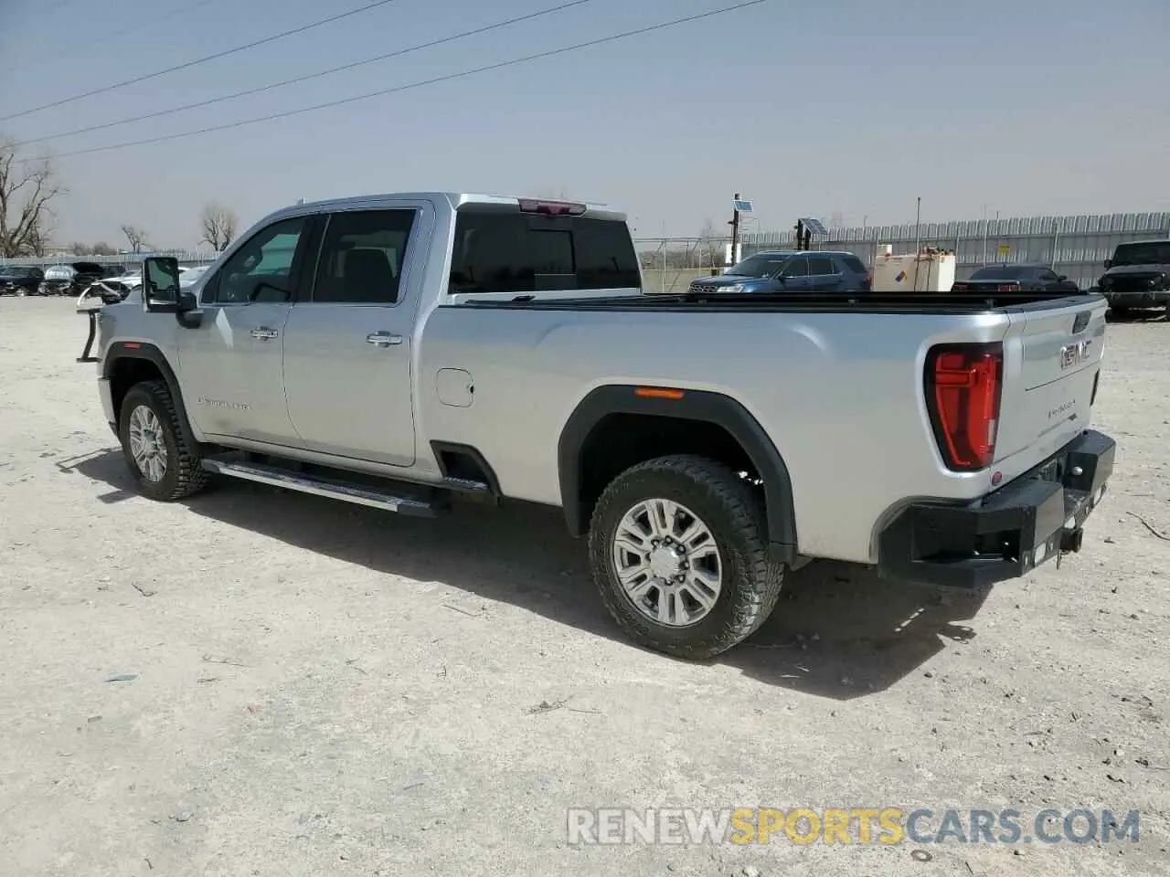 2 fotografías del automóvil dañado 1GT49REY1LF282970 GMC SIERRA 2020