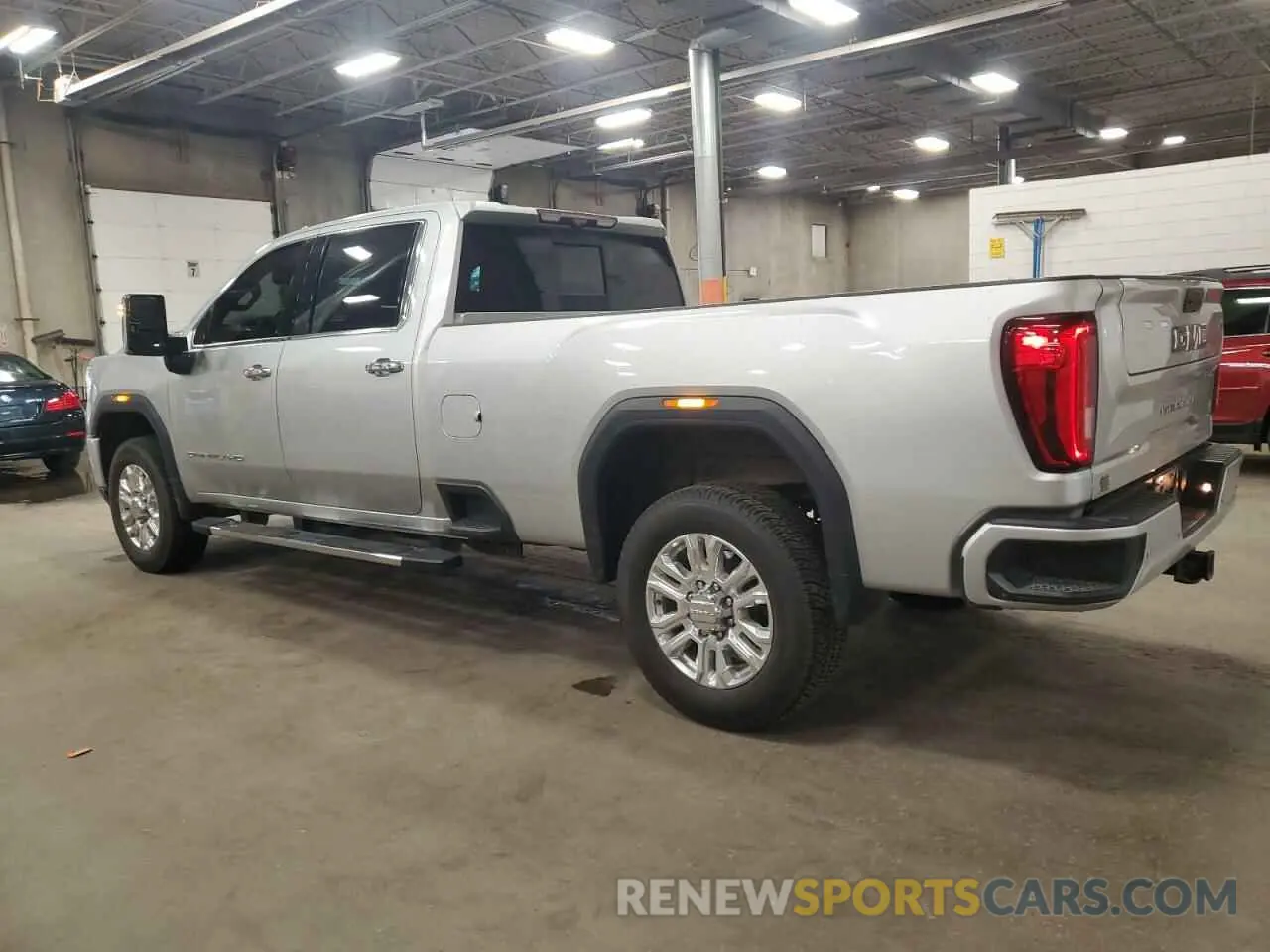 2 fotografías del automóvil dañado 1GT49REY6LF309662 GMC SIERRA 2020