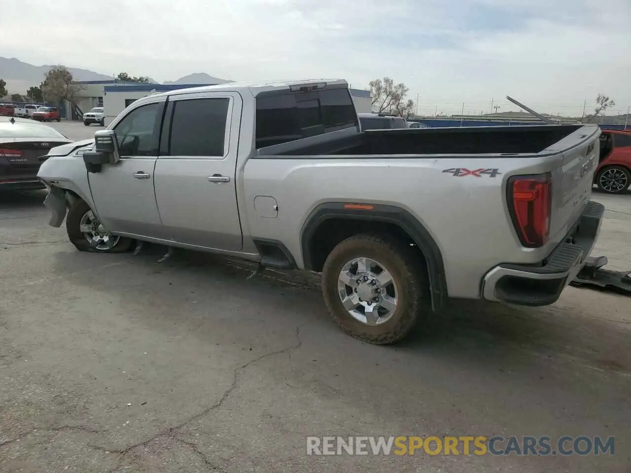 2 fotografías del automóvil dañado 1GT49REY9LF107074 GMC SIERRA 2020