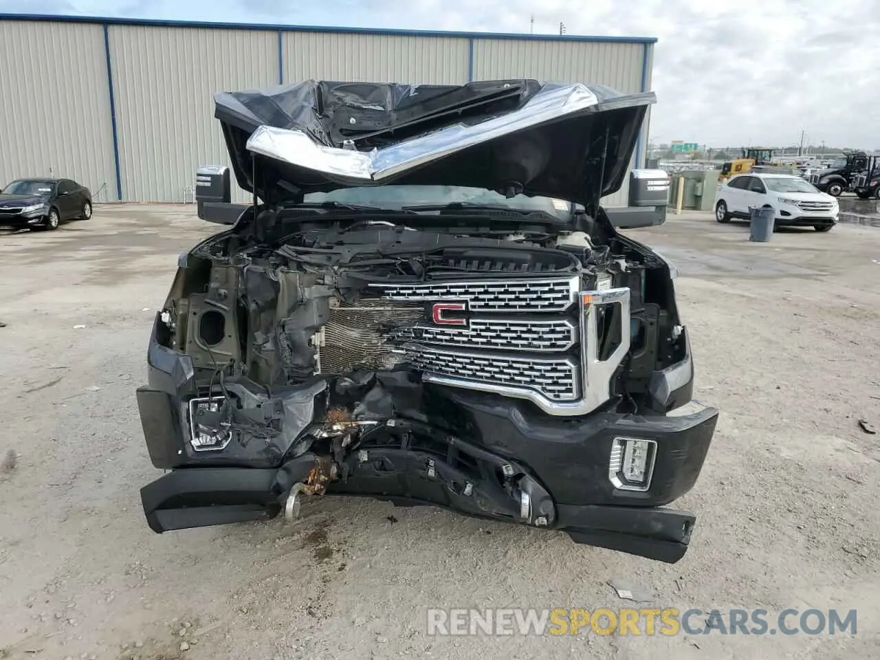 5 fotografías del automóvil dañado 1GT49REY3NF362807 GMC SIERRA 2022