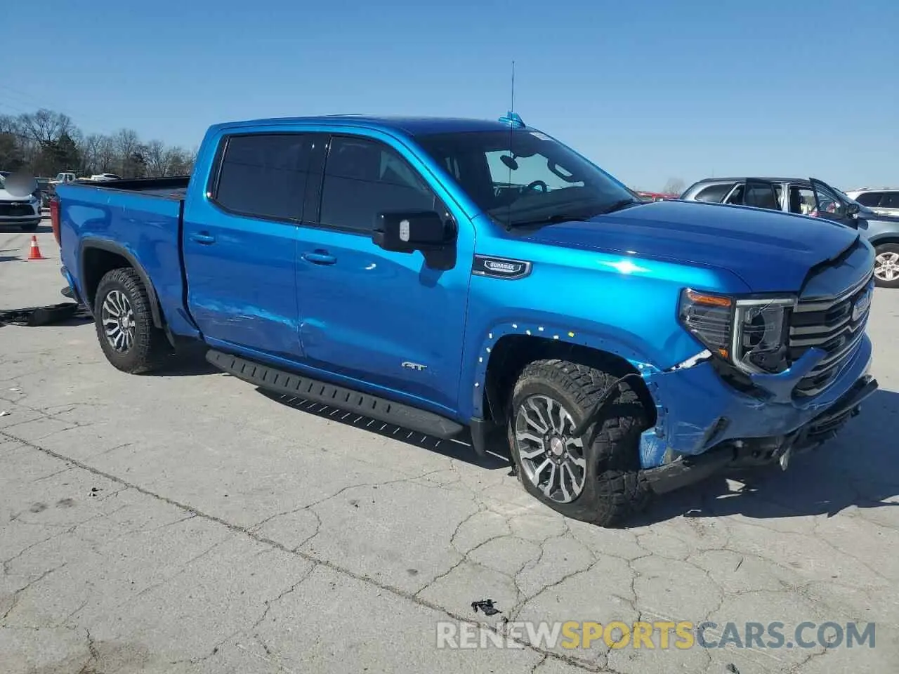 4 fotografías del automóvil dañado 1GTUUEET2NZ599492 GMC SIERRA 2022
