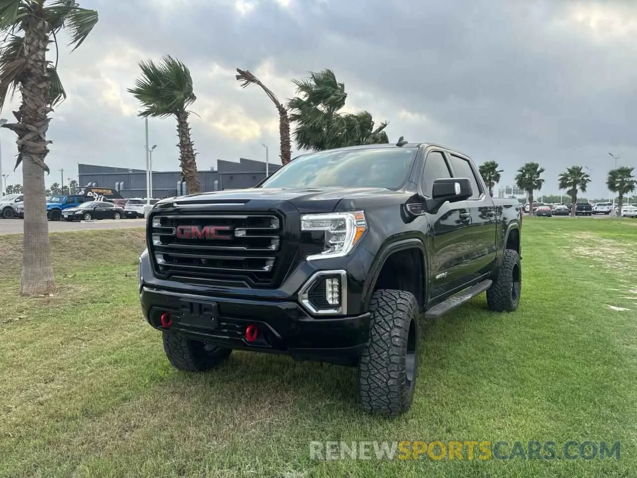 2 fotografías del automóvil dañado 3GTP9EEL9NG130186 GMC SIERRA 2022