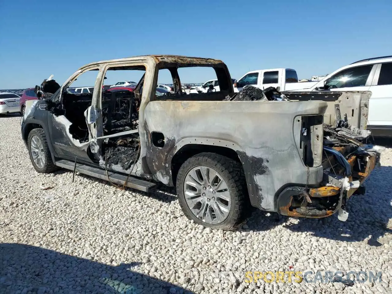 2 fotografías del automóvil dañado 3GTU9FEL9NG180644 GMC SIERRA 2022