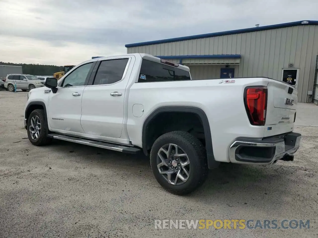 2 fotografías del automóvil dañado 3GTUUDEL0NG650305 GMC SIERRA 2022