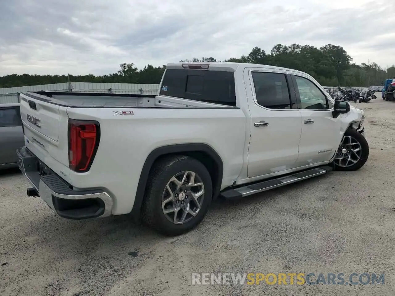 3 fotografías del automóvil dañado 3GTUUDEL0NG650305 GMC SIERRA 2022