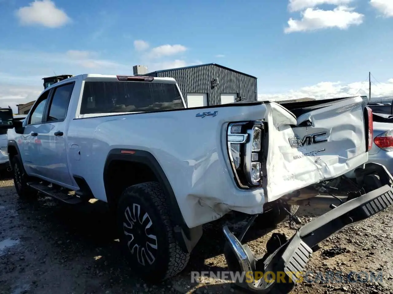 2 fotografías del automóvil dañado 1GT19LEY0PF182834 GMC SIERRA 2023