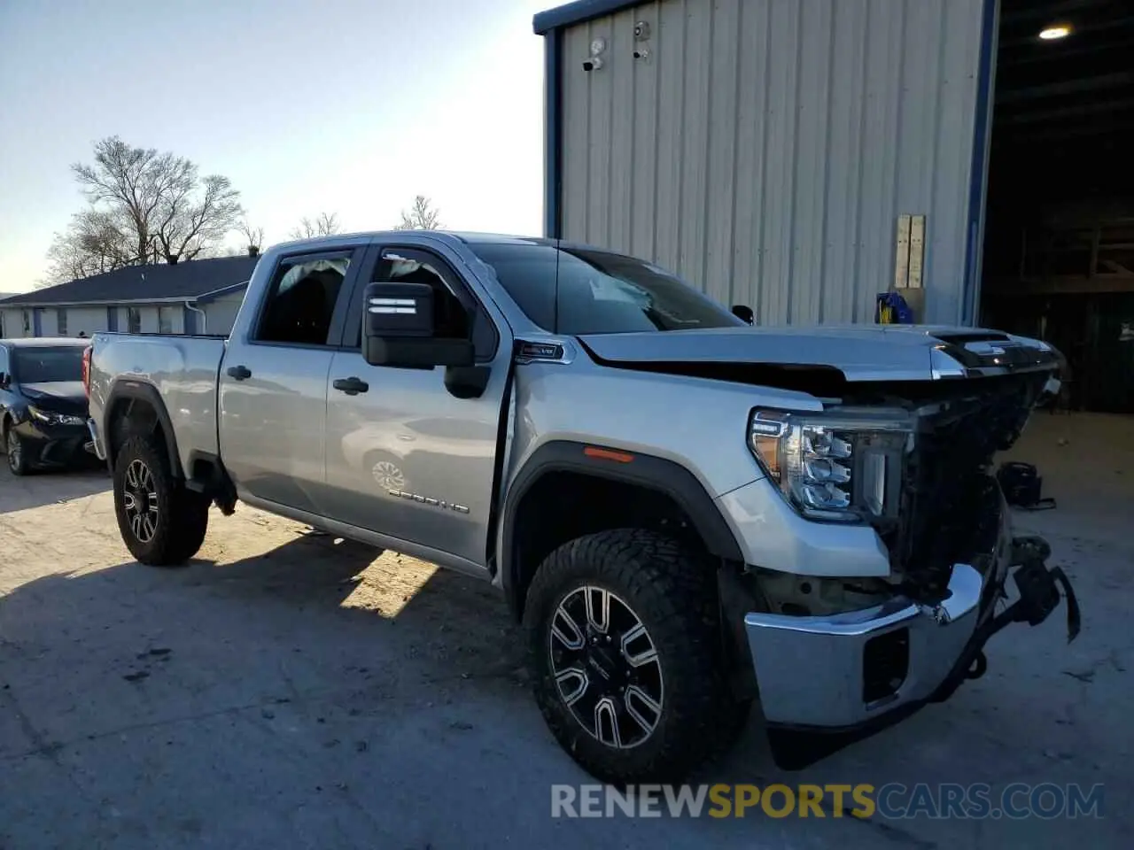 4 fotografías del automóvil dañado 1GT49LE76PF174578 GMC SIERRA 2023