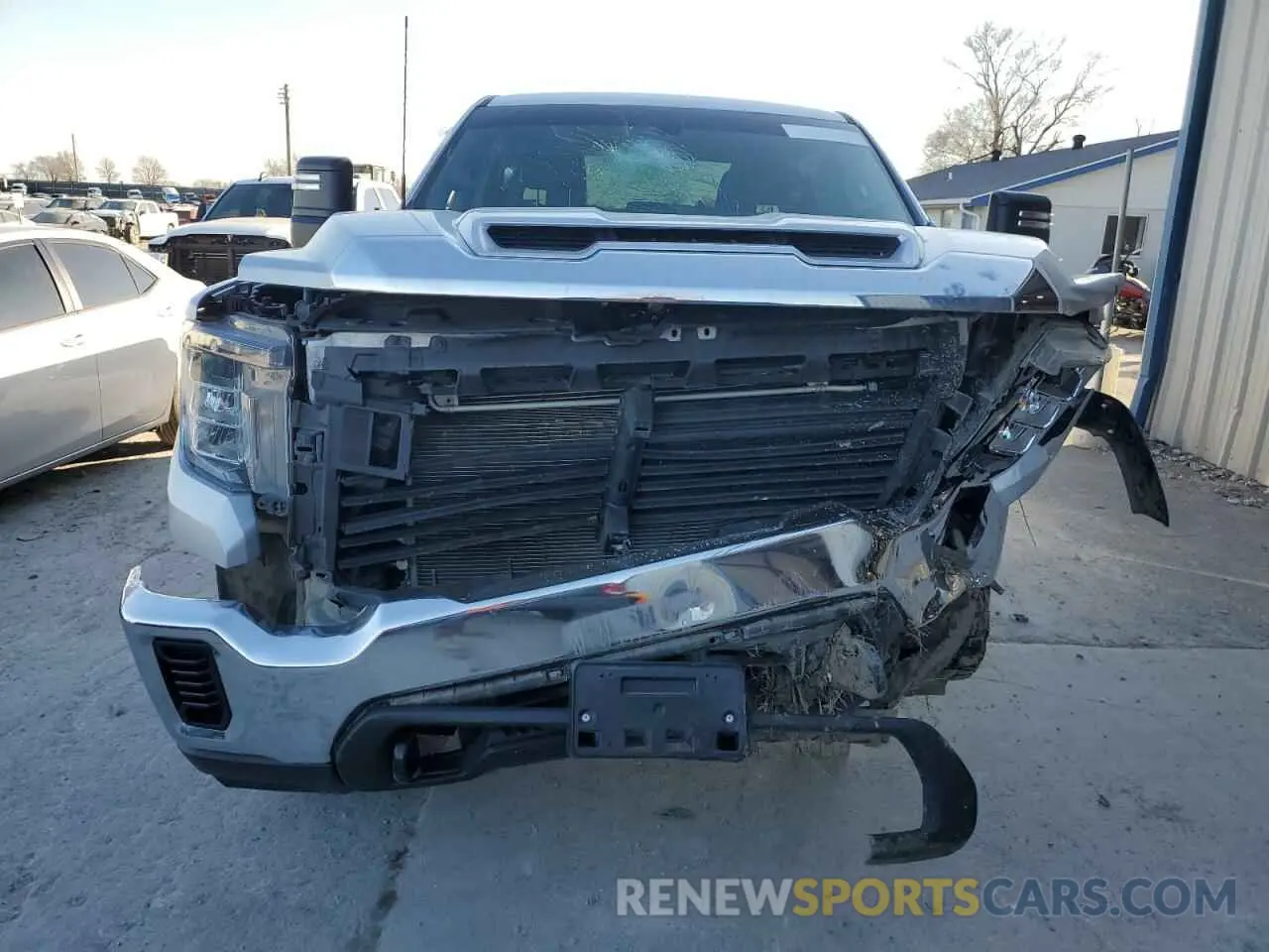 5 fotografías del automóvil dañado 1GT49LE76PF174578 GMC SIERRA 2023