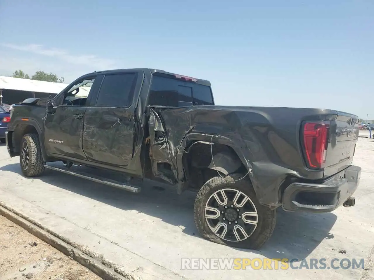 2 fotografías del automóvil dañado 1GT49PEY3PF225809 GMC SIERRA 2023