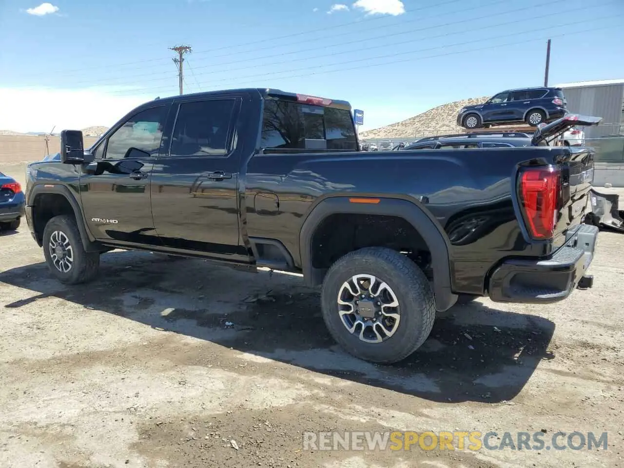 2 fotografías del automóvil dañado 1GT49PEYXPF215469 GMC SIERRA 2023