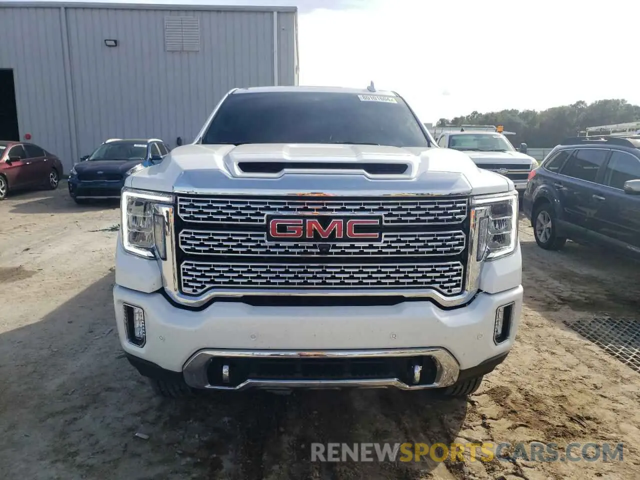 5 fotografías del automóvil dañado 1GT49REY0PF103436 GMC SIERRA 2023