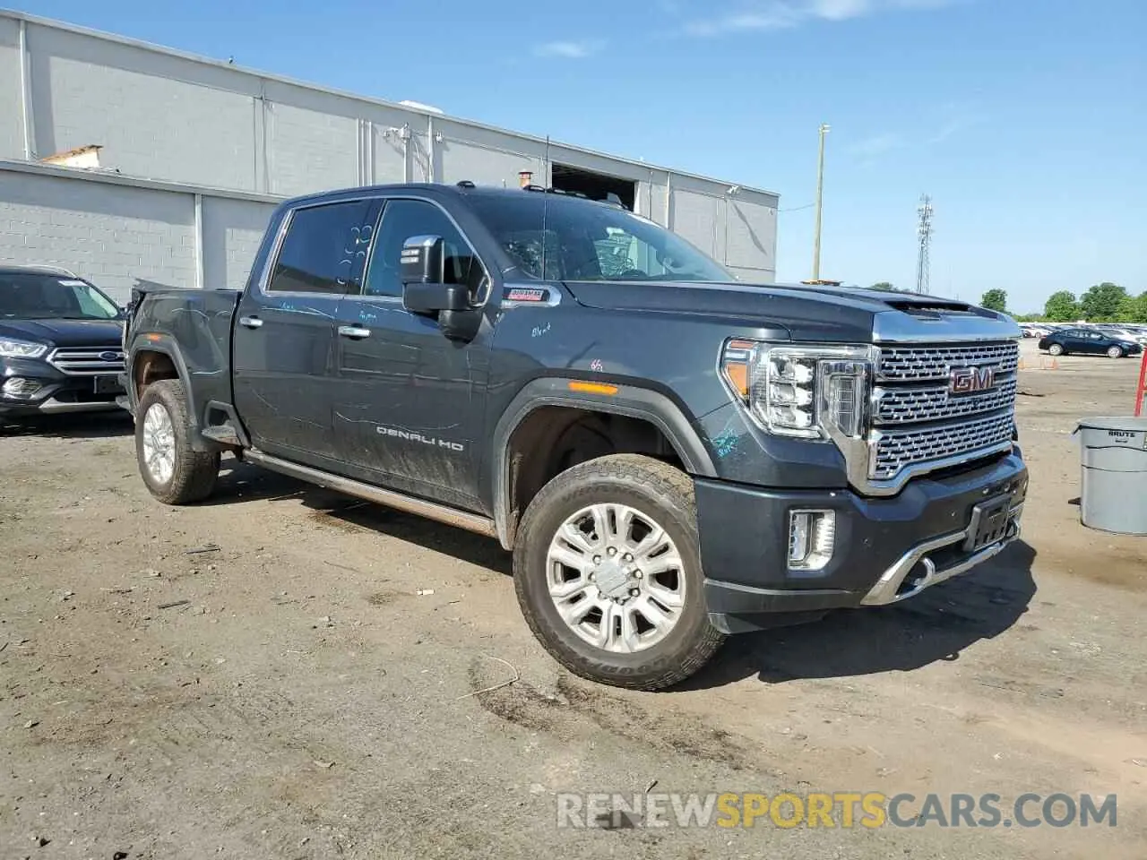 4 fotografías del automóvil dañado 1GT49REY2PF128287 GMC SIERRA 2023