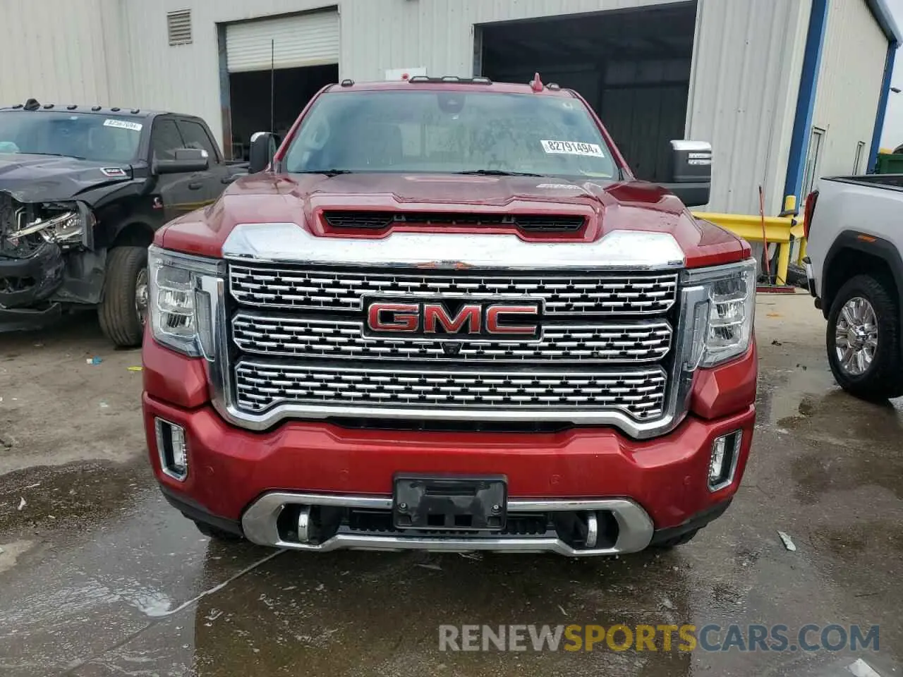 5 fotografías del automóvil dañado 1GT49REY4PF109482 GMC SIERRA 2023