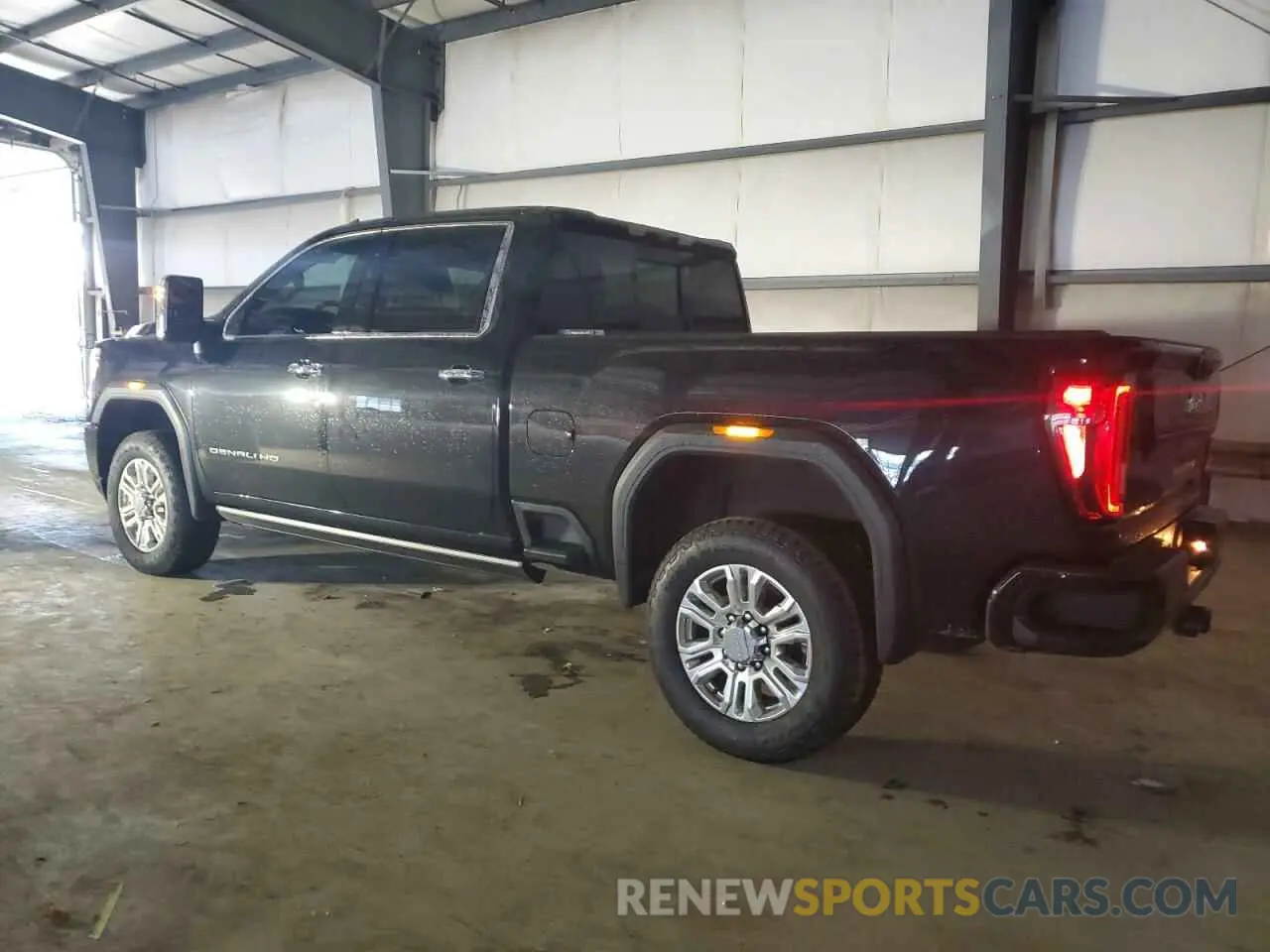 2 fotografías del automóvil dañado 1GT49REY8PF219385 GMC SIERRA 2023