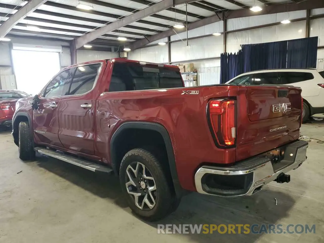 2 fotografías del automóvil dañado 3GTUUDE84PG265229 GMC SIERRA 2023