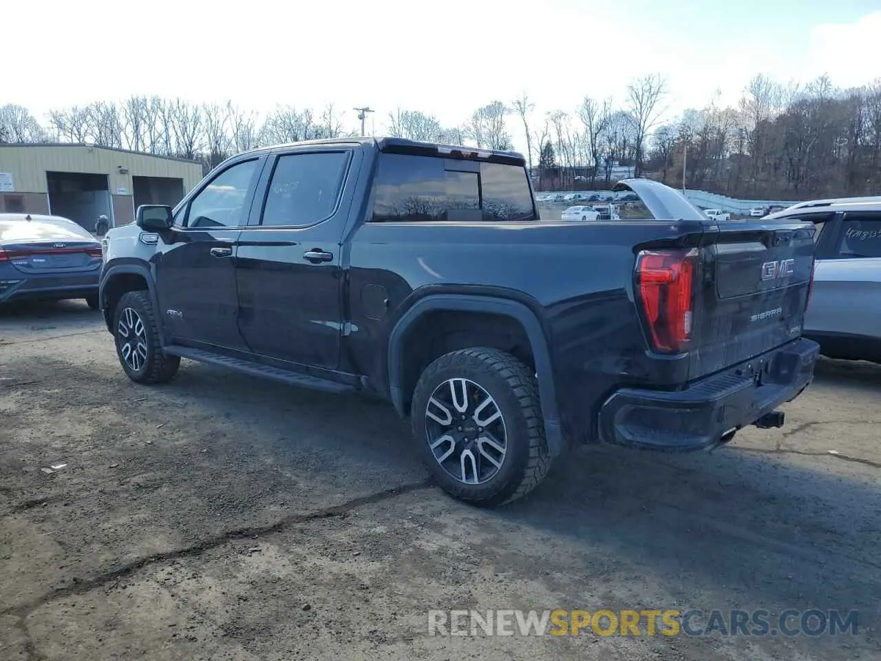 2 fotografías del automóvil dañado 3GTUUEEL2PG254045 GMC SIERRA 2023