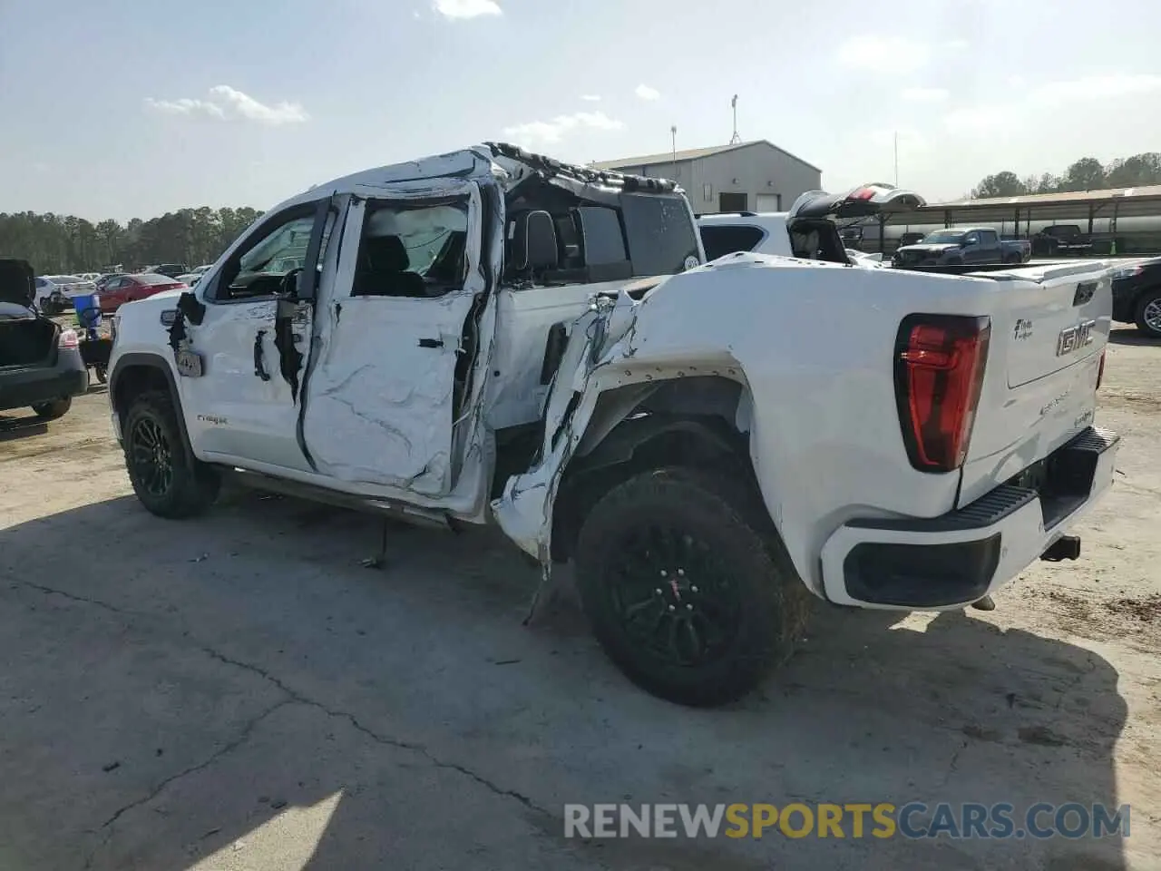 2 fotografías del automóvil dañado 3GTUUFEL9PG136421 GMC SIERRA 2023