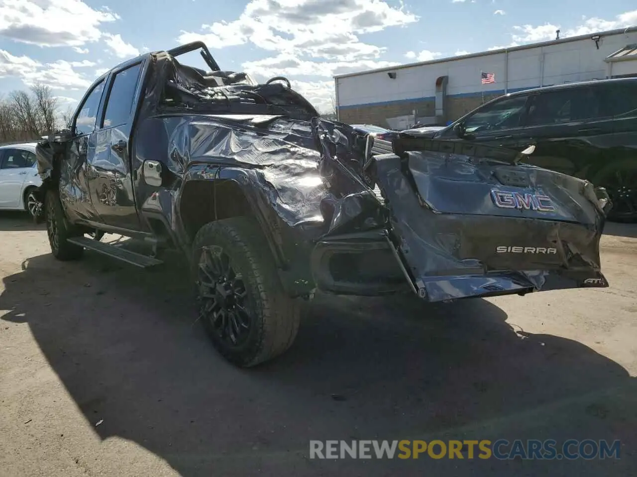 2 fotografías del automóvil dañado 1GT49PE77RF264722 GMC SIERRA 2024