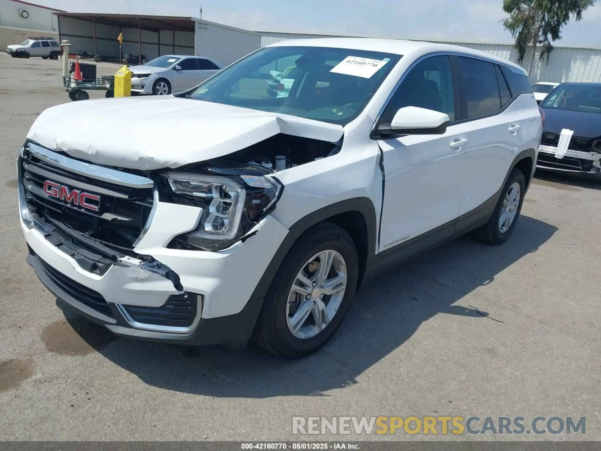 2 fotografías del automóvil dañado 3GKALMEV3NL228452 GMC TERRAIN 2022