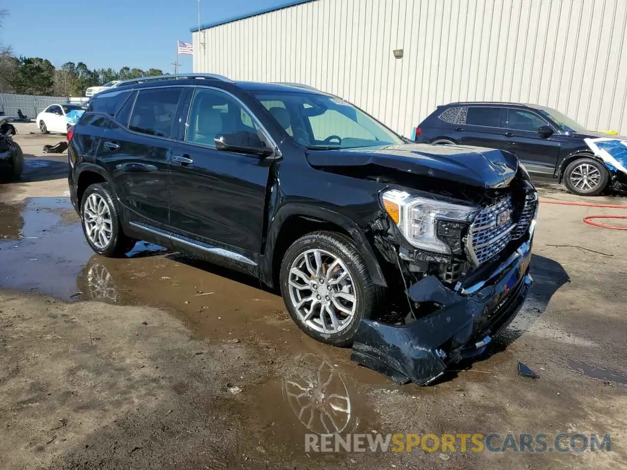4 fotografías del automóvil dañado 3GKALXEG1PL217617 GMC TERRAIN 2023