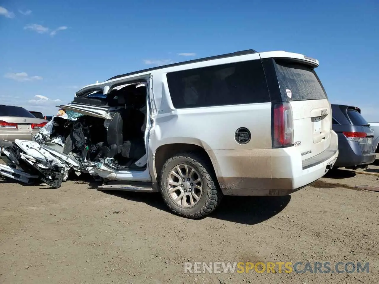 2 fotografías del automóvil dañado 1GKS2GKC0KR309103 GMC YUKON 2019